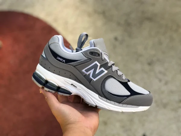 NB2002R Grau Blau Thisisneverthat x New Balance 2002R Retro Casual Sportschuhe M2002RTH