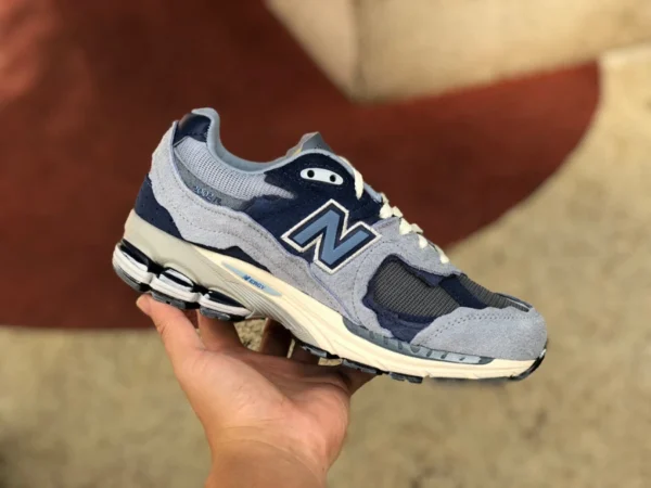 nb2002r Blau und Weiß New Balance Patchwork Retro Casual Laufschuhe für Männer und Frauen Immergrün und Weiß M2002RDI